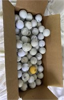 Box of golf balls including Bridgestone, top