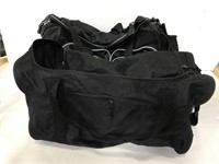 Two black duffle bags