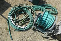 Garden hose reel (as is) & hoses