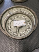 Metal weight plates (1) 45LBS (1) 25LBS