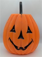 (N) Halloween candy pail jack-o'-lantern blow