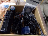 Box of chargers, cords and router