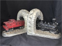 PAIR OF PLASTER TRAIN BOOKENDS - 8.5 X 7.5 X 7 “