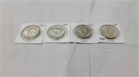 4 silver Kennedy half dollars