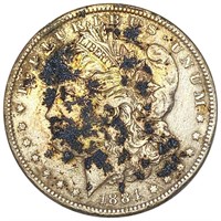1884 Morgan Silver Dollar ABOUT UNCIRCULATED