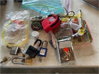 Pad locks, ear plugs, emergency kit