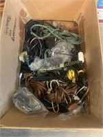 Box of assorted cords and chargers