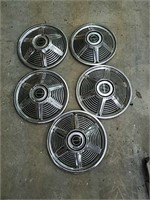 5 Vintage Mustang hubcaps, some of them have