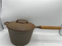 Cast iron pot with wood handle