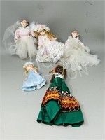 collection of various vintage dolls