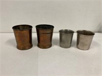 Copper and silver cups.