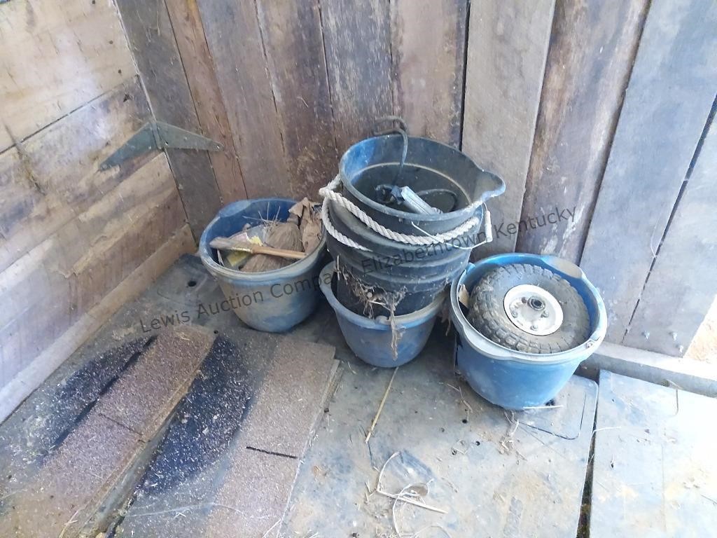 Group of feed buckets and content