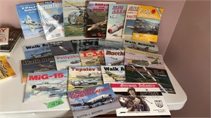 Fighter plane, magazines, and books