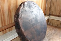 43 INCH ROUND WOOD COVERED IN PLASTIC TARP