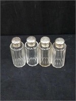 Group of sterling-cap cologne bottles