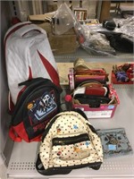 Assorted backpacks, coin purses and more.