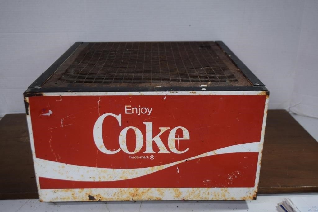 Metal Coke Display. Looks like Compressor Cover