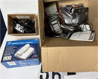 Box of telephone, cords and remotes