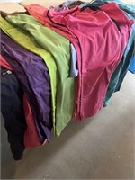 10 pairs of scrub pants assorted sizes.