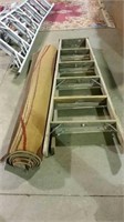 6 foot wood step ladder and 5x8 area rug