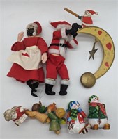 (E) Dried apple head Mr and Mrs Claus figurines,