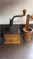 Antique iron and wood, coffee grinder, and a