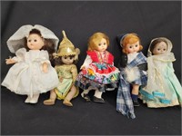 5 dolls.  4 Madame Alexander and 1 Vogue bride