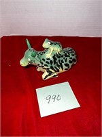 PORCELAIN FROG ON COW