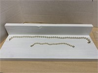 A Costume Quality Pearl Necklace And Bracelet.