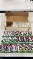 Lot of football cards with a lot of duplicates.