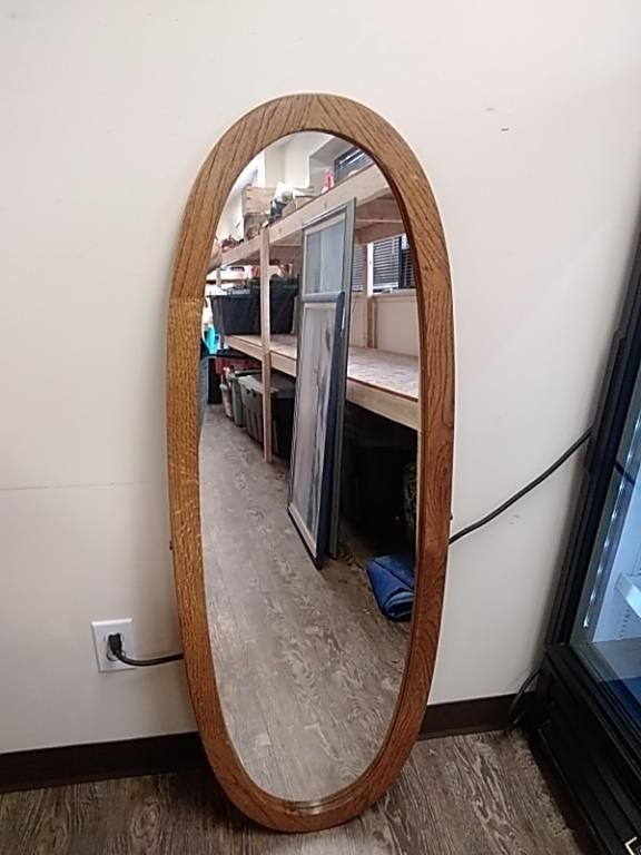 Framed 48-in oval mirror