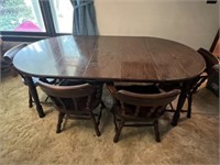 Round dining table and chairs with 2 leaves