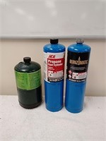 Group of small propane bottles