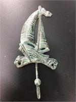 Cast iron sail boat wall hook with a lovely faux p