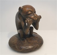 HANDCARVED WOODEN MONKEY EATING STATUE
