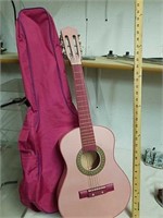 Pink kids acoustic guitar with bag