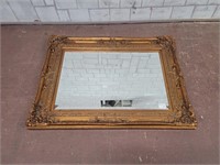 Antique mirror with large frame
