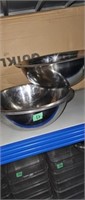 Four stainless steel bowls