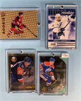4-mixed Hockey Rookie cards see desc