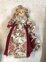 Collectible Doll w/stand & flower dress
