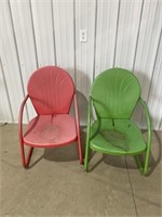 Two metal lawn chairs