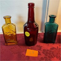Three vintage small bottles