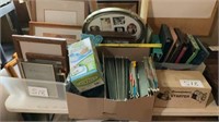 Boxes of picture frames, filing cabinet files,