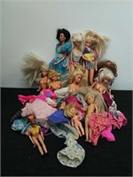 Vintage Barbies with clothing and accessories and