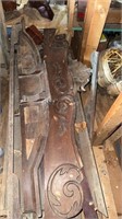 Stack of antique architectural wood pieces, tops