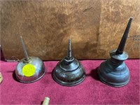 THREE OIL CANS WITH SPOUTS