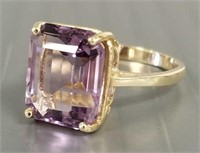 14K gold ring set with emerald cut amethyst