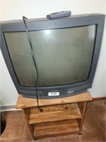 OLDER SHARP TV W/ PRESSED WOOD STAND