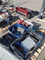 Pallet full of totes with tools