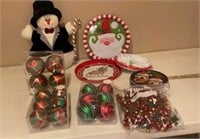 Christmas tins, ornaments, and snowman